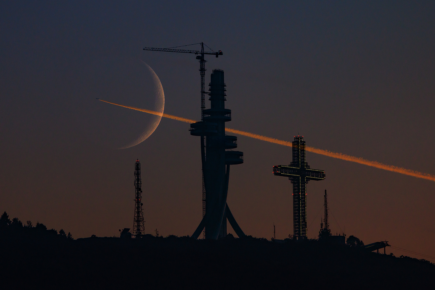 Crescent Moon and Plane